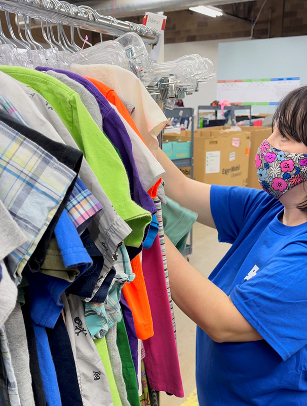 staff processing clothes staff working