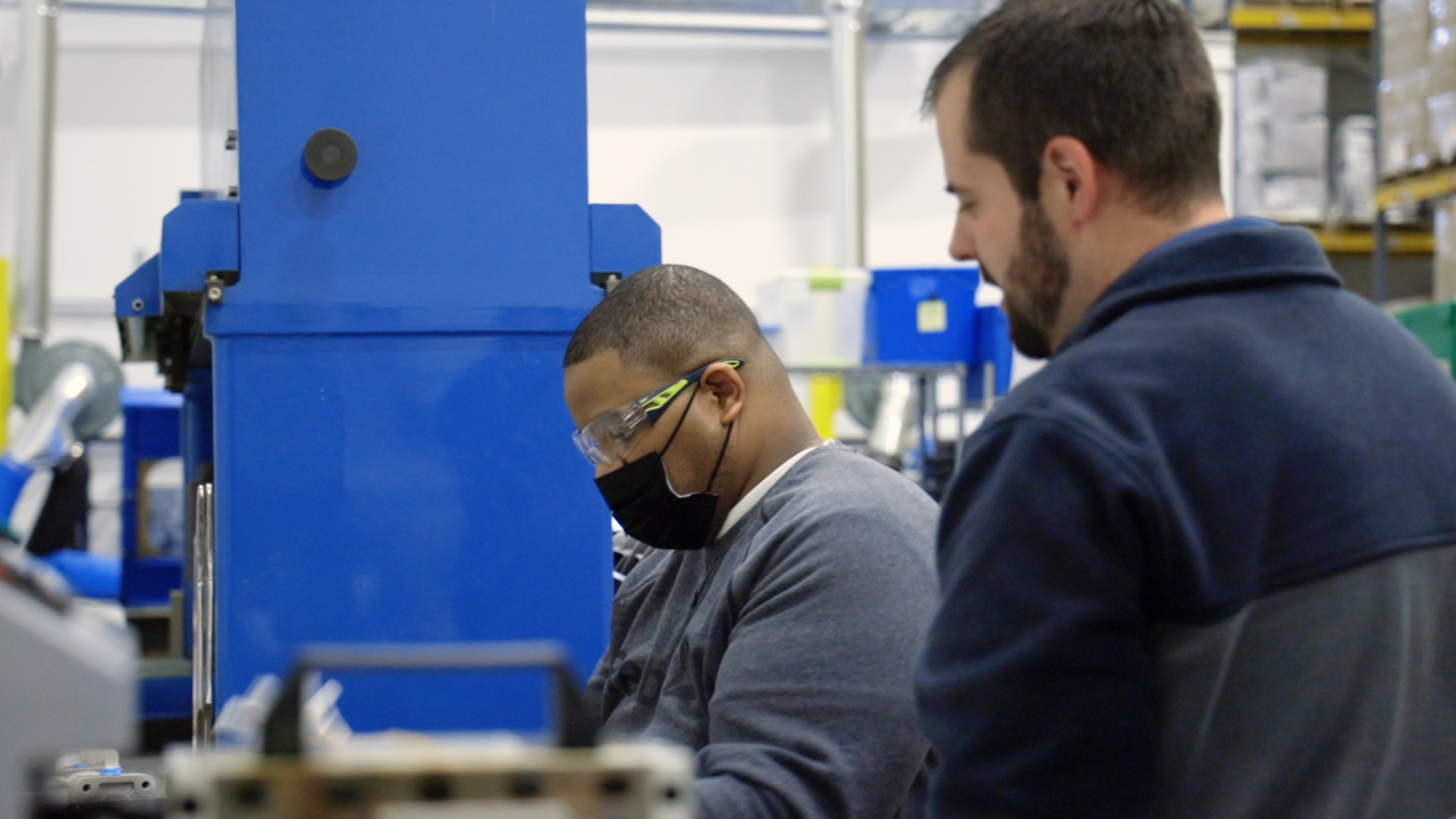 visions program.1 Man working at assembly line