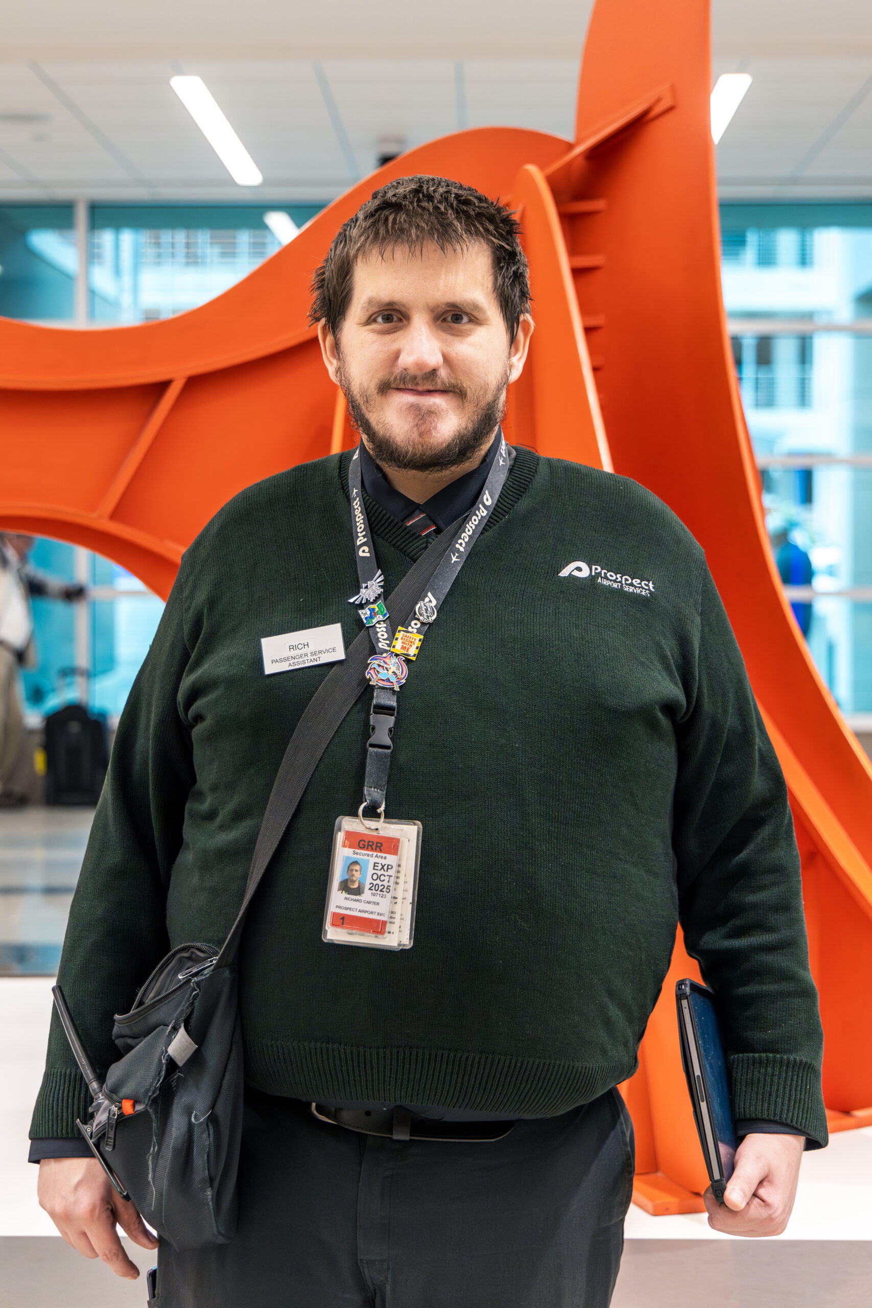 Rich From VIsions Man standing in airport